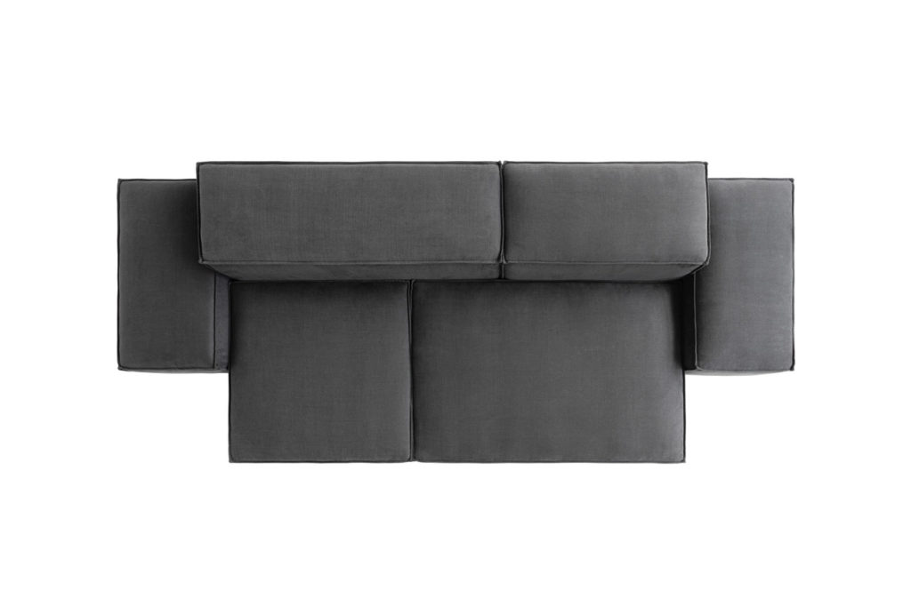 Sofakombination des Modells Puzzle mit grauem Stoffbezug und schwarzen Kunststoffgleitern